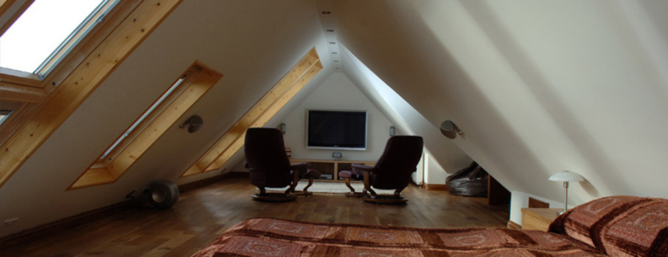 Home cinema in loft conversion bedroom